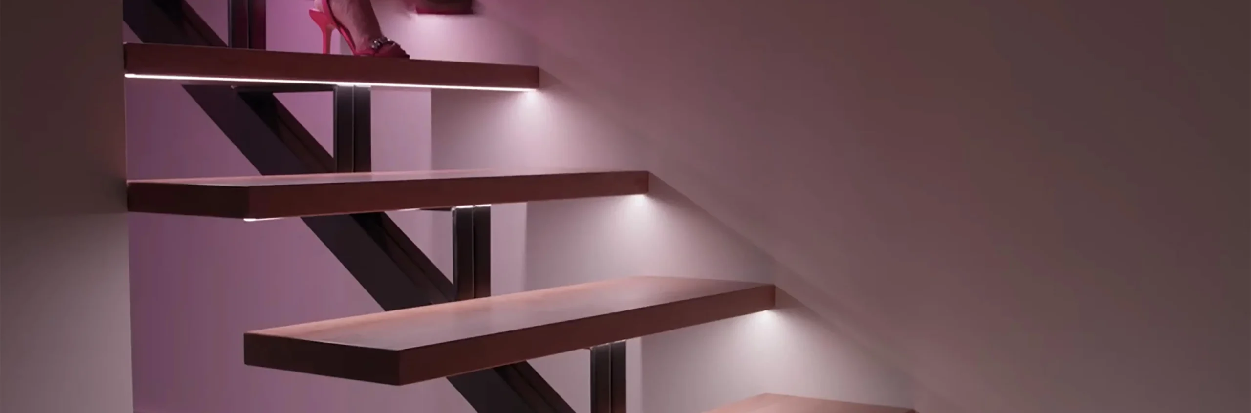 LED strip lighting under floating stairs